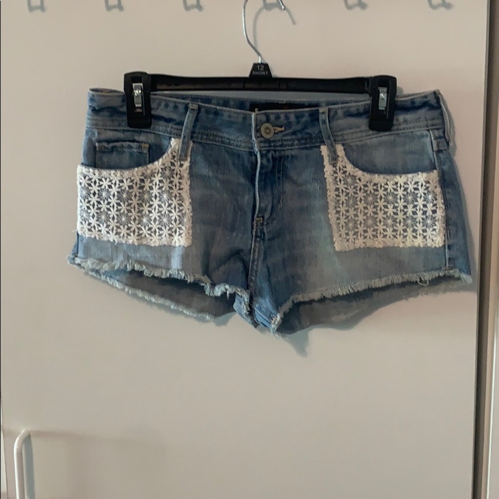 Hollister denim shorts with white lace pockets